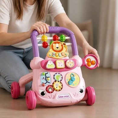 Дитячі ходунки-каталка з розвивальним центром MA570pink рожеві &bull; Ігрові ходунки з піаніно, сортером, лабіринтом, годинником і кульками для дітей від 12 місяців