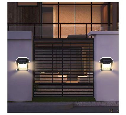 Уличный фонарь на солнечной батарее с датчиком движения HW 999-2W Solar Interaction Wall Lamp · Настенный наружный светильник · 3 режима освещения